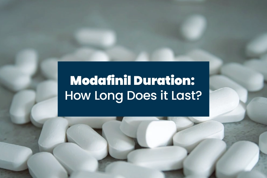 Modafinil tablets with text about duration and how long it lasts.