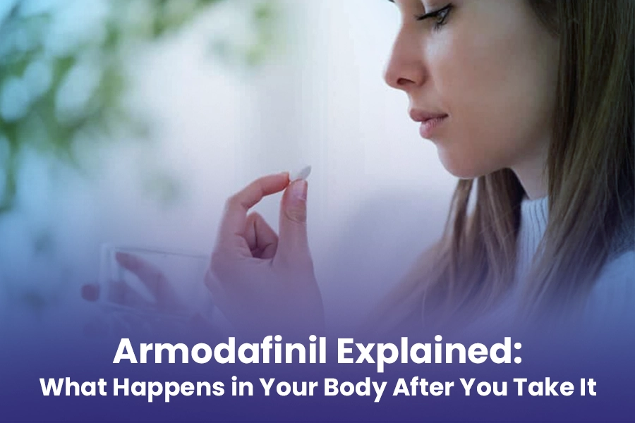 Woman taking armodafinil pill to improve wakefulness and focus